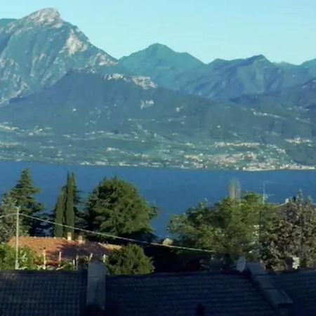 Warm, Nice & Amazing Lake-View Apartment Сан-Дзено-ди-Монтанья Экстерьер фото